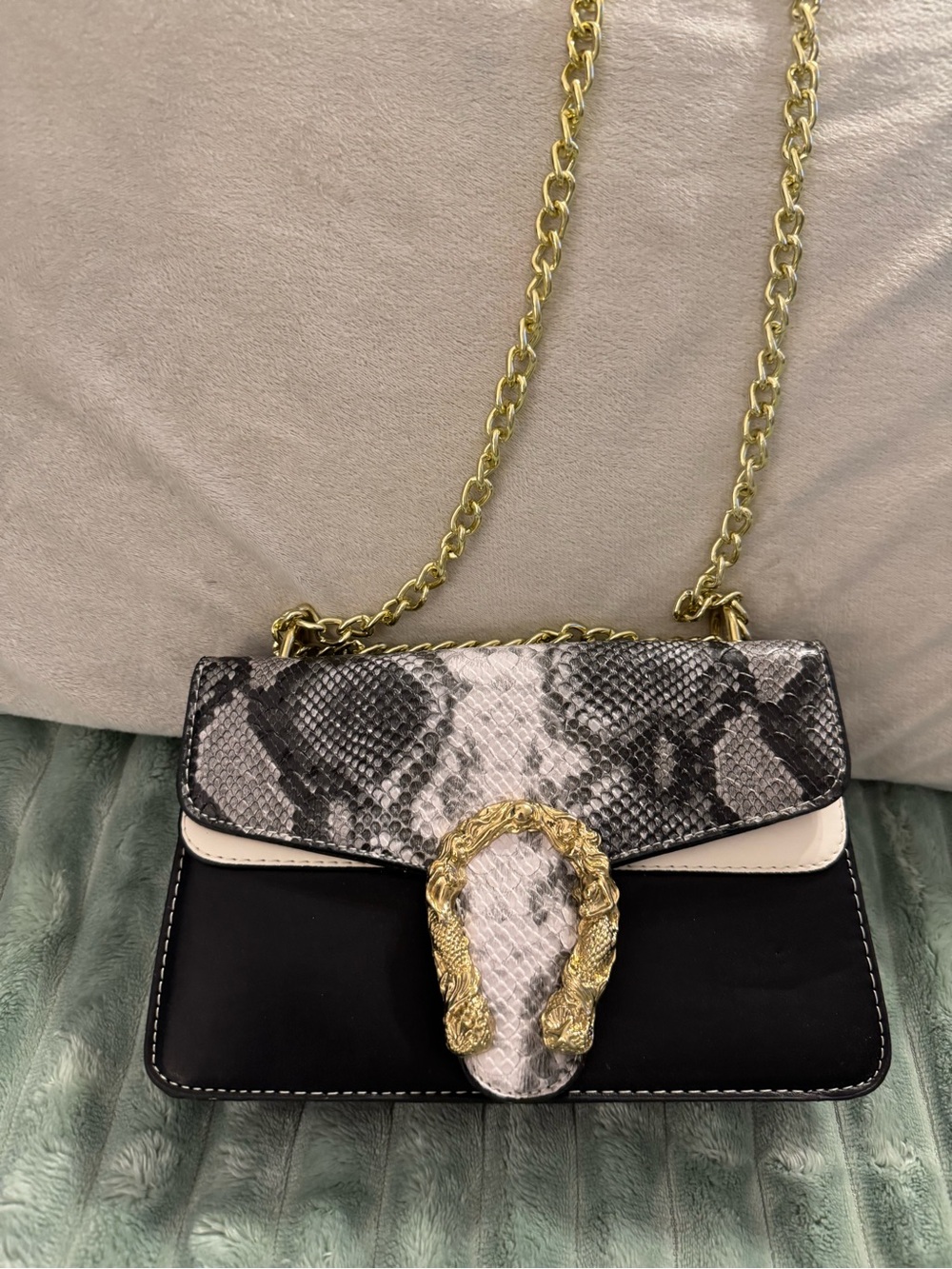 Black and Snake-Print Crossbody Bag with Gold Chain